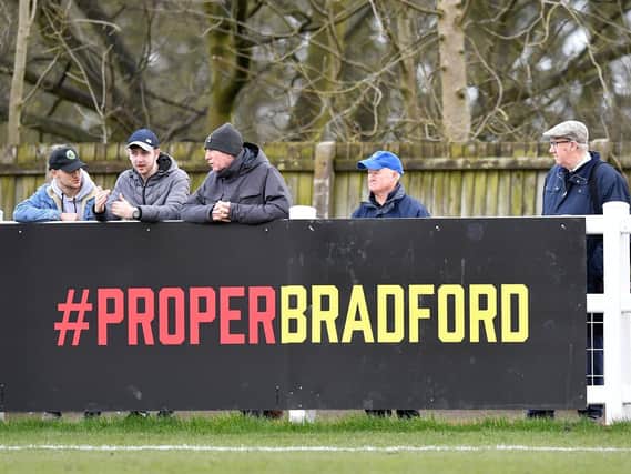 Fans behind a #Proper Bradford sign during the Vanarama National League North match at Horsfall Stadium, Bradford, earlier this month Credit: Dave Howarth/PA Wire