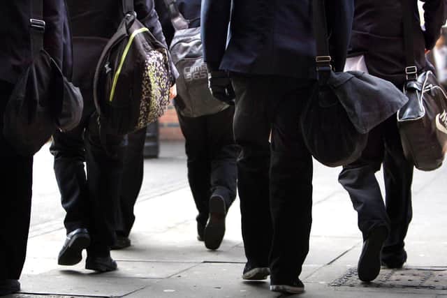 Police officers are going into schools, while the force is funding community projects in order to prevent young people turning to crime. Picture: PA