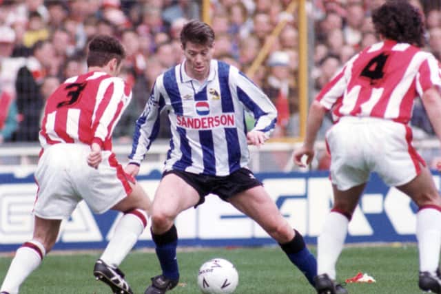 LEGEND: 
Chris Waddle, in action for Sheffield Wednesday during the 1993 FA Cup semi-final against arch-rivals Sheffield United.