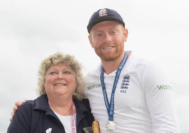 Jonny Bairstow with his mum Janet Bairstow and his man of the match award during a Test match at Headingley in 2016 (Picture: PA)