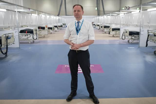 NHS England's chief executive Simon Stevens during a visit to the ExCel centre, London, which is being made into the temporary NHS Nightingale hospital, comprising of two wards, each of 2,000 people, to help tackle coronavirus.