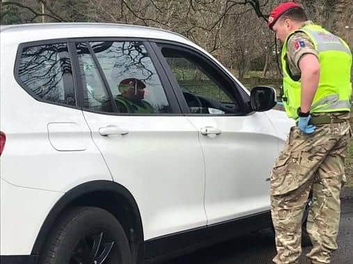 Soldiers from the British Army and the local police force in Yorkshire speaking with drivers in Catterick. Photo: North Yorkshire Police.