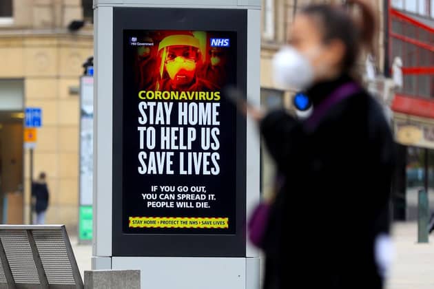 Electronic billboards displays a message warning people to stay home in Sheffield as the UK continues in lockdown to help curb the spread of the coronavirus. Picture: Mike Egerton/PA Wire