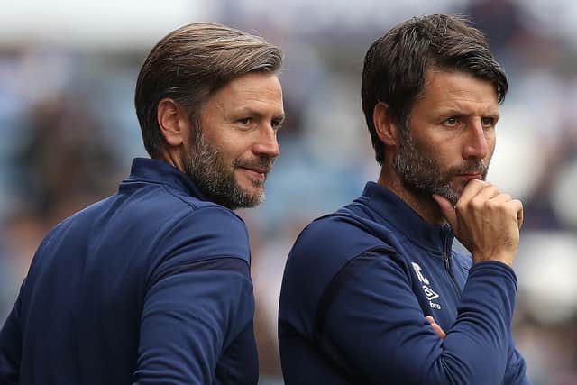Huddersfield Town manager Danny Cowley, right, with brother and assistant manager Nicky, left. Picture: Martin Rickett/PA