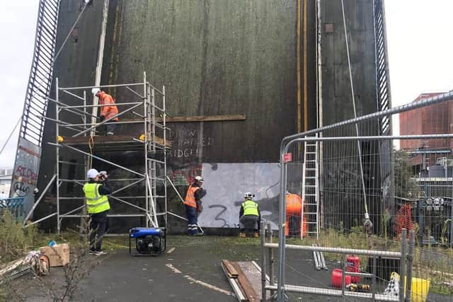 The Banksy mural was removed from the brisge last year by council workers
