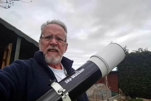 Astronomer George McManus, with his telescope, in the garden of his East Yorkshire home
