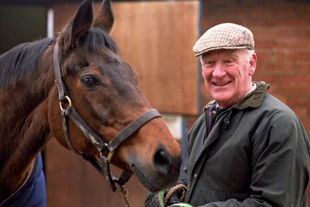 The late trainer Ginger McCain with Red Rum in 1992.