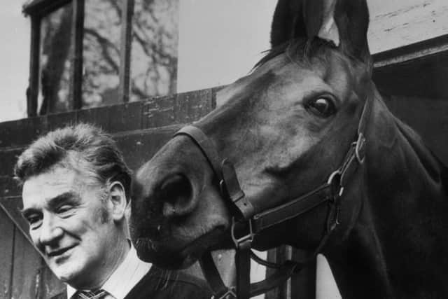Ginger McCain with Red Rum in 1974 when the horse won a second National.