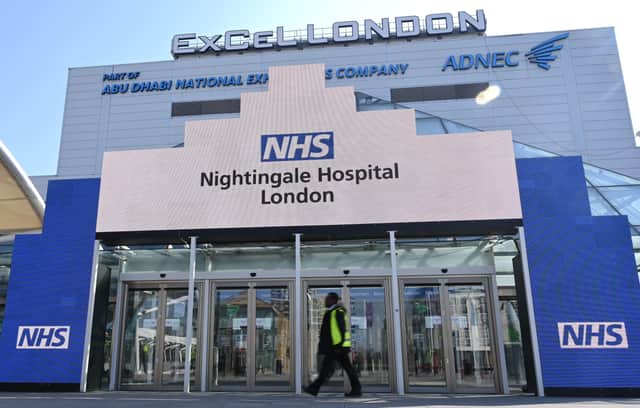 Newly installed signage for the field hospital to be known as the NHS Nightingale Hospital being created at the ExCeL London exhibition centre in London (Getty Images)