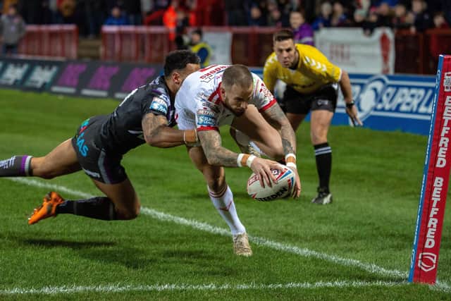 OVER THE LINE: Ben Crooks scores Hull KR's first try against Wakefield Trinity in their meeting back in January.  Picture: Bruce Rollinson