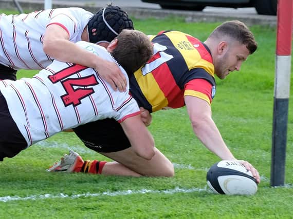 Try time: North Premier action between Harrogate RUFC and Yorkshire rivals Ilkley. Picture: Richard Bown