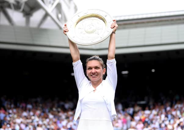 Extended champion: 2019 winner Simona Halep of Romania will be Wimbledon ladies singles champion for 12 months longer after the 2020 All England Club Championships were suspended due to the global coronavirus pandemic. (Picture: PA)