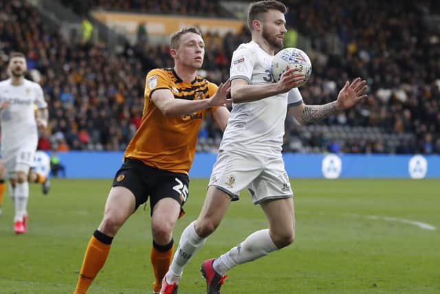 UNSETTLED: Hull City's on-loan defender Matthew Pennington (pictured with Leeds United's Stuart Dallas) is keen to find a permanent club in the summer