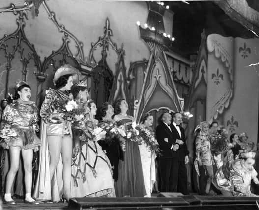 1957:

The last performance at Leeds Theatre Royal. On stage, singing a chorus with the cast of the pantomime "Queen of Hearts" are Margery Manners, Wilfred and Mable Pickles and Barney Colehan.