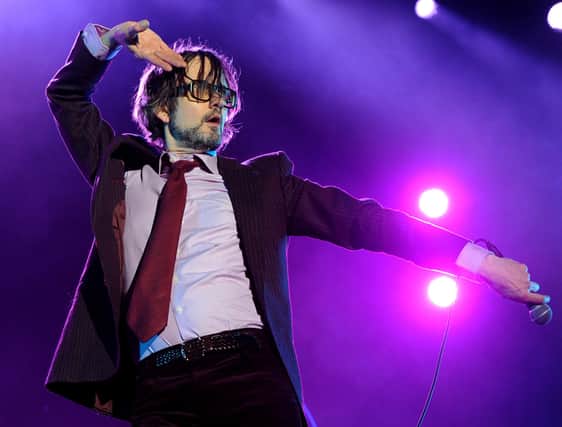 Jarvis Cocker of Pulp performs onstage during day 1 of the 2012 Coachella Valley Music & Arts Festival at the Empire Polo Field on April 13, 2012 in Indio, California.  (Photo by Kevin Winter/Getty Images for Coachella)