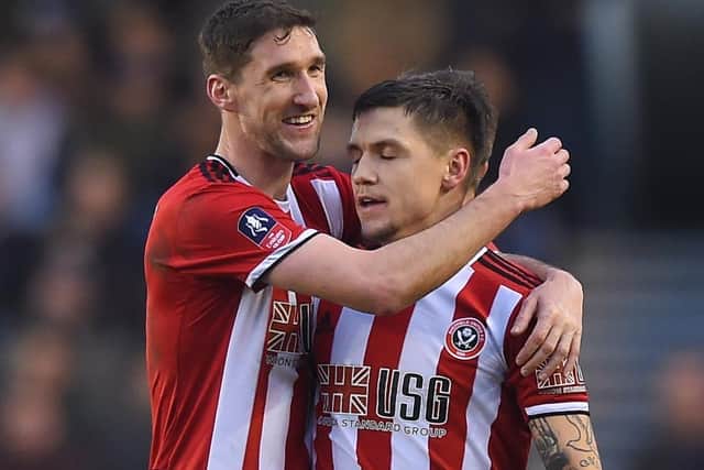 EARLY RETIREMENT: Chris Basham of Sheffield United, left, says the closedown has given him some idea of what retirement from the game must be like.