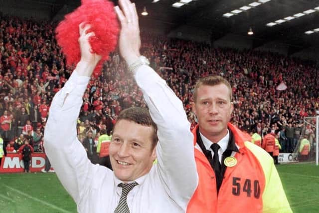 GREAT DAY: Manager Danny Wilson celebrates Barnsley's promotion to the Premiership. Picture: Paul Barker/PA.