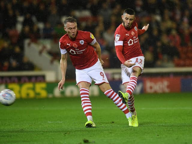 DYNAMIC DUO: Barnsley’s Conor Chaplin, right and Cauley Woodrow have both impressed this seaso, says Danny Wilson, but it remains to be seen whether they remain at the club. Picture: Jonathan Gawthorpe.