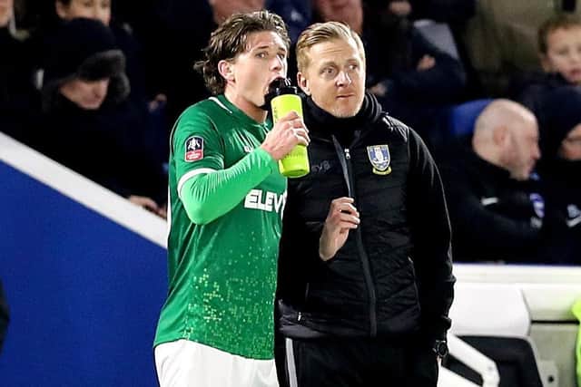 Sheffield Wednesday's Adam Reach (left) with manager Garry Monk (right) (Picture: PA)