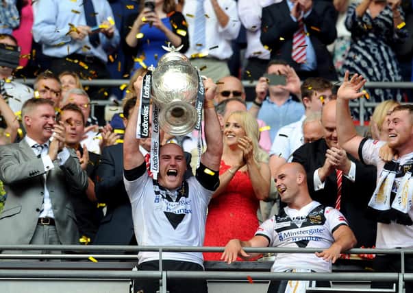 MAGIC MOMENT: Gareth Ellis lifts the Challenge Cup trophy after leading Hull FC to victory over Warrington Wolves at Wembley in August 2016. Picture : Jonathan Gawthorpe