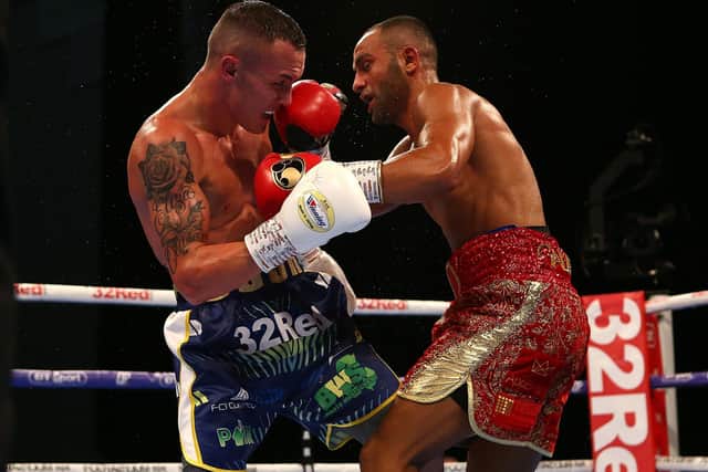 Josh Warrington (left) and Kid Galahad (right) during The IBF World Featherweight Championship at the First Direct Arena last June (Picture: Dave Thompson/PA Wire)