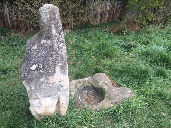 The Hob Stone with the plague stone next to it
