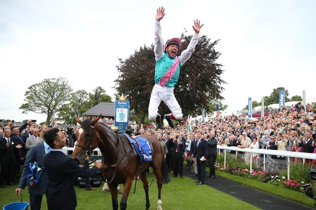 In happier times - Frankie Dettori celebrates the Yorkshire Oaks win of Enable in trademark style.