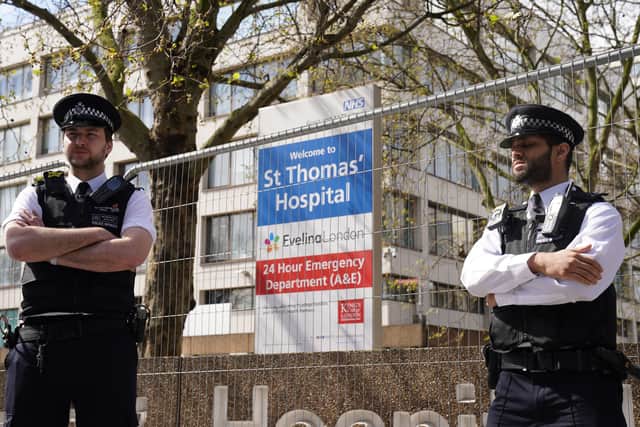 A strong police presence outside St Thomas' Hospital where Boris Johnson was admitted on Sunday for the effects of coronavirus.