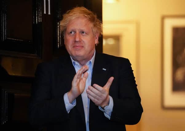 Boris Johnson - pictured at last Thursday's Clap for Carers tribute - was moved into intensive care last night as his coronavirus condition worsened.