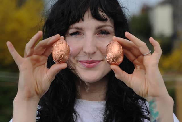 Business woman Lily Gaskell, owner of Truffle Pig Chocolates in Sheffield, pictured holding her vegan chocolate egg creations. Photo credit: Simon Hulme.