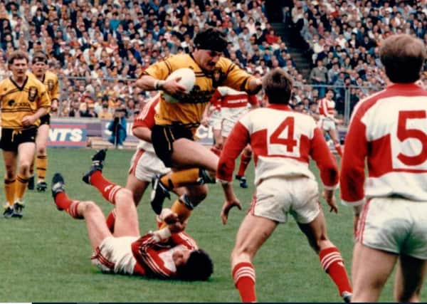 MARAUDING: Kevin Ward forces his way through in his own inimitable style in Castleford’s 1986 Challenge Cup final win over Hull Kingston Rovers, the formidable prop understandably inducted into the club’s Hall of Fame.Picture courtesy of Castleford Tigers Heritage Project.