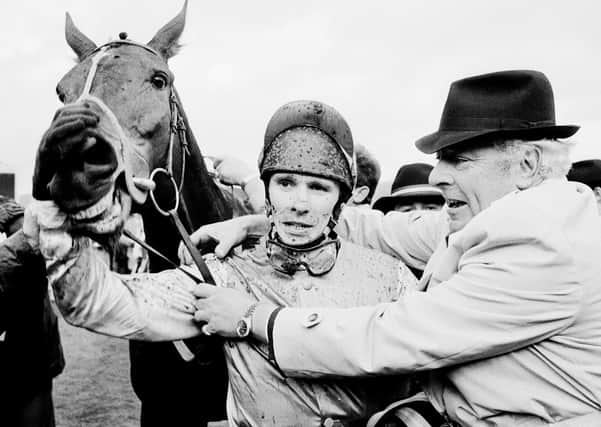 Winners: David Horton, owner of Celtic Shot, congratulates jockey Peter Scudamore and his horse after their victory in the Waterford Crystal Champion Hurdle Challenge Trophy on the first day of the Cheltenham's National Hunt Festival.