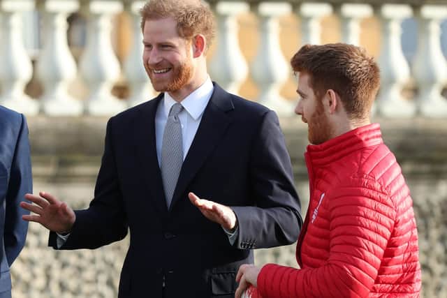 The Duke of Sussex talks with Leeds Rhinos player, James Simpson, in the Buckingham Palace gardens, London, as he hosts the Rugby League World Cup 2021 draws. (Picture:: Yui Mok/PA Wire)