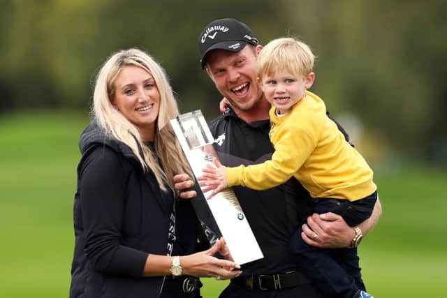 Champion: Danny Willett, wife Nicole and son Zachariah James with the trophy after winning the BMW PGA Championship.