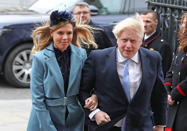 Boris Johnson and Carrie Symonds, his pregnant patner, before both were struck down by Covid-19.