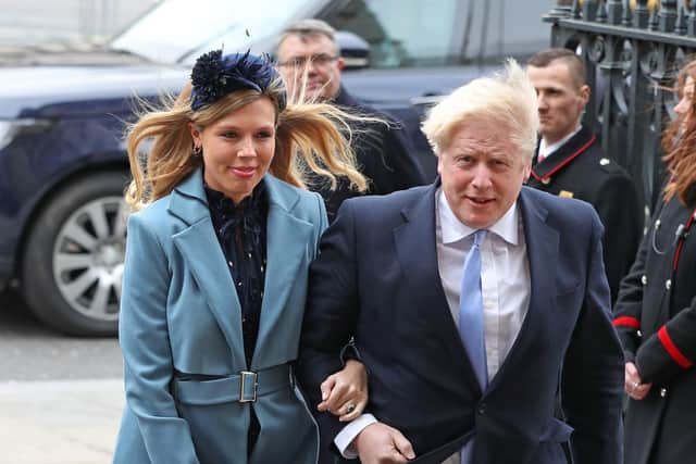 Boris Johnson with his fiancee Carrie Symonds before the Covid-19 pandemic struck.
