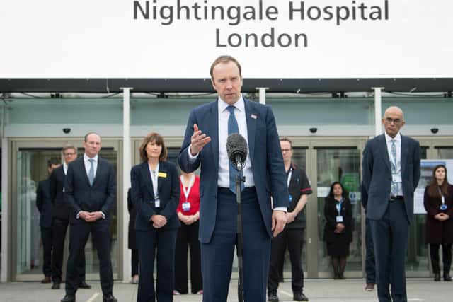 Health and Social Care Secretary at the new Nightingale Hospital in London.