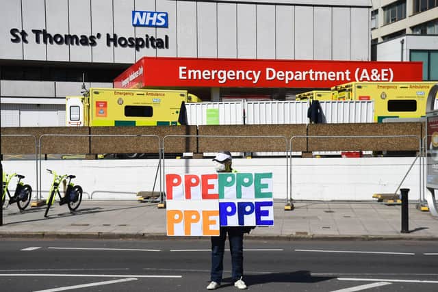 A PPE campaigner outside St Thomas' Hospital where Boris Johnson was treated for Covid-19. Photo: Kirsty O'Connor/PA Wire
