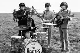 The Beatles during the filming of the movie Help. The band split up 50 years ago. (Credit: PA).