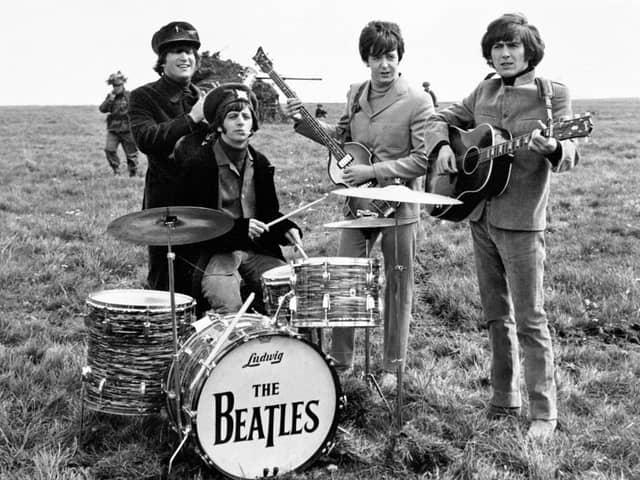 The Beatles during the filming of the movie Help. The band split up 50 years ago. (Credit: PA).