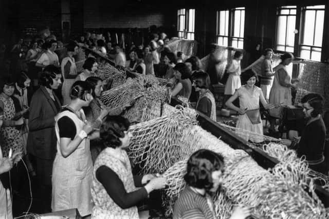 8th April 1931:  Women at work at a factory at Grimsby making trawling nets used by fishermen in the North Sea.  (Photo by Topical Press Agency/Getty Images)