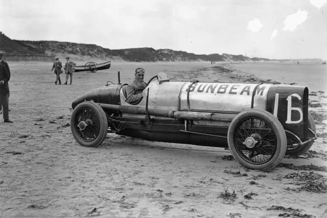 June 1922:  Captain Malcolm Campbell (1885 - 1948) in his Sunbeam racing car on the beach at Saltburn. He later went on to hold both the land and water speed records.  (Photo by Topical Press Agency/Getty Images)