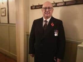 Colin Dean, whose family cannot attend his funeral, pictured with his service medals on Remembrance Day. Photo: Kelsey Dobson