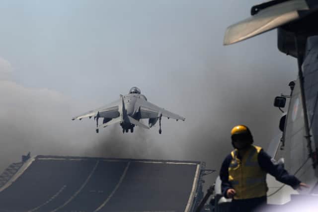 A Harrier jet of 1(F) Joint Force Squadron takes off from the flight deck of HMS Ark Royal during Exercise Auriga on July 14, 2010 at sea in Onslow Bay near North Carolina.