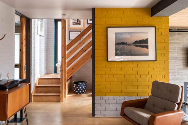 The couple who own the house are creatives who have used bold colours