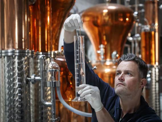 Steven Green, founder of Harrogate Tipple, makes hand sanitiser at his gin distillery in North Yorkshire. Photo: Danny Lawson/PA