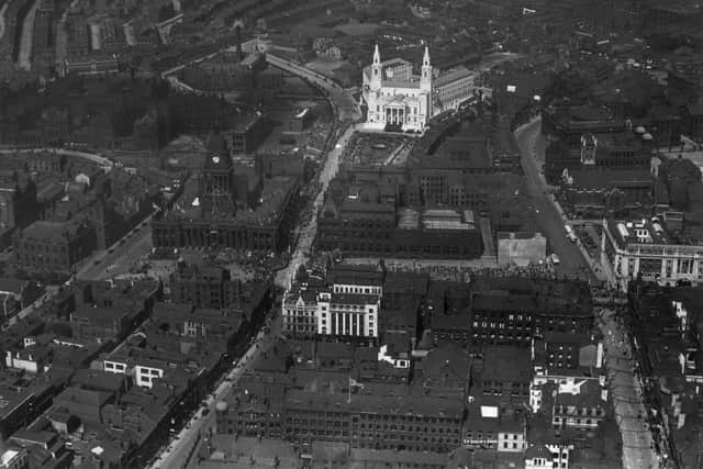 1933:  An aerial view of Leeds showing the new Civic Hall (the white building) and the Victorian town hall on the Headrow.  (Photo by Central Press/Getty Images)
