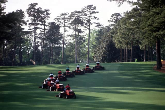 A procession of lawnmowers tend to the fairways in 1993 (Picture: Steve Munday/ALLSPORT)
