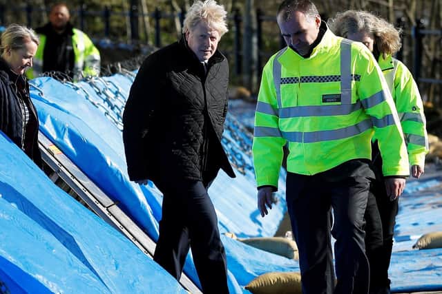 Should Boris Johnson invest in flood defences to help rebuild the national economy?
