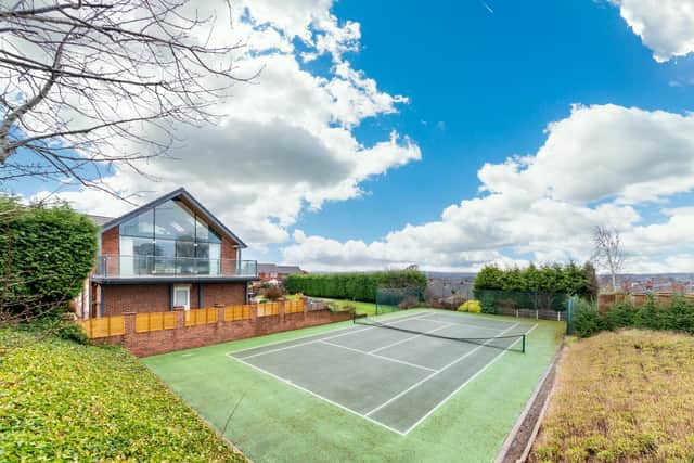 The house has a tennis court